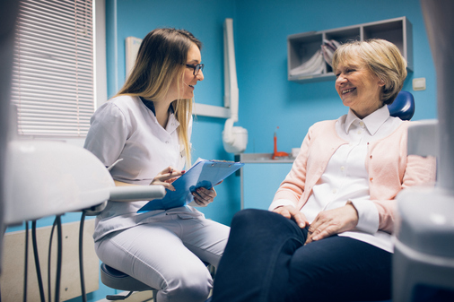 Doctor and Patient discussing dental implants at McNickle Family Dentistry 